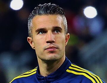 Van Persie gives son debut 'as a coach - not as a dad'