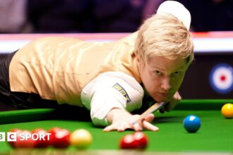 'Better than ever' Robertson advances in UK Championship
