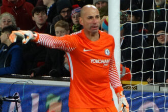 Injury-time Romero overhead kick rescues point for Spurs