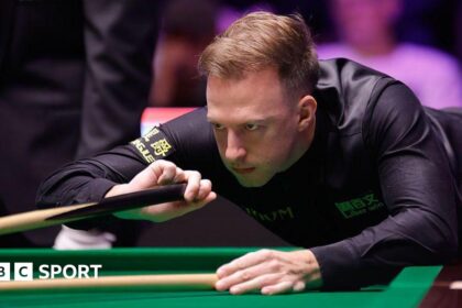 Trump sweeps Ding aside to reach UK semi-finals