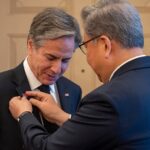 Peace medal and YMCA: Trump steals the show at World Cup draw