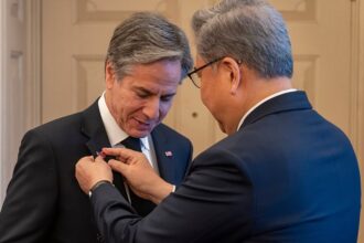 Peace medal and YMCA: Trump steals the show at World Cup draw