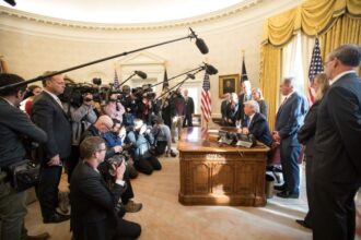 Champion Trump beats Robertson to reach UK final