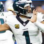 Hurts loses ball twice on same play as Eagles beaten