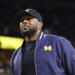 Authorities: Sherrone Moore remains in custody during assault investigation