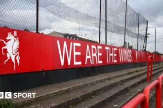 Man arrested and match postponed as non-league manager injured