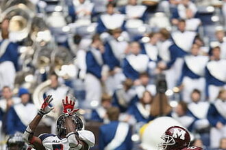 Ohio State nips West Virginia in 2OT on late basket