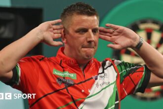 Davies ready for challenge of 'different breed' Littler