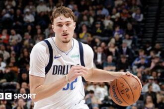 Teenager Flagg makes history in Mavericks defeat