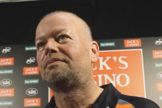 Wade breezes through after Van Barneveld dumped out of World Championship