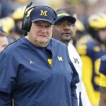Interim coach Biff Poggi wants chance to fix 'malfunctioning' Michigan