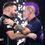Merk 'stunned' after beating 'legend' Wright at Worlds