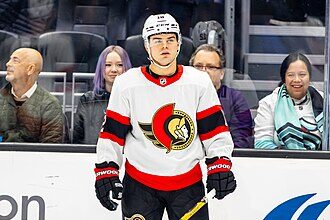 Alex DeBrincat's three points help Red Wings shut out Canadiens