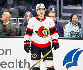 Alex DeBrincat's three points help Red Wings shut out Canadiens