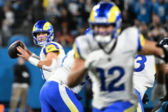 Rams QB Matthew Stafford suffered sprained finger in win over Panthers, but is 'good to go' vs. Bear