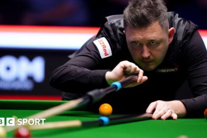 Rejuvenated Wilson reaches Masters quarter-finals