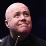 Higgins wins decider against Zhao to reach semi-finals