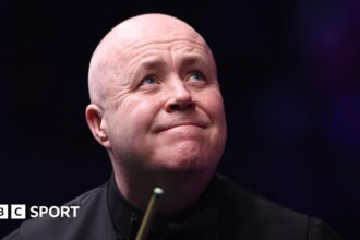 Higgins wins decider against Zhao to reach semi-finals