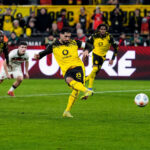 Can's 11th penalty gives BVB a late win