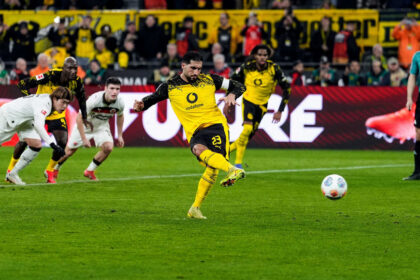 Can's 11th penalty gives BVB a late win