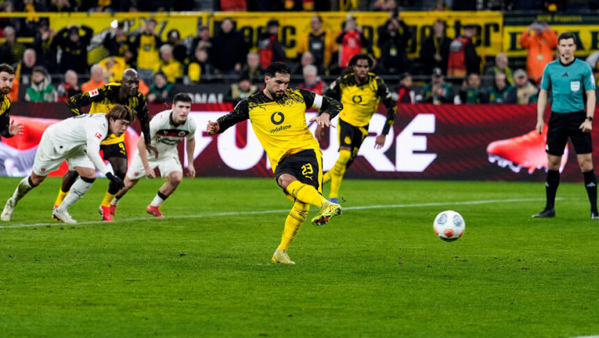 Can's 11th penalty gives BVB a late win