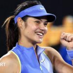 Raducanu overcomes slow start to sail into second round
