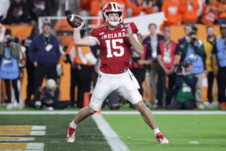 Unblemished Indiana fends off Miami for first college football title