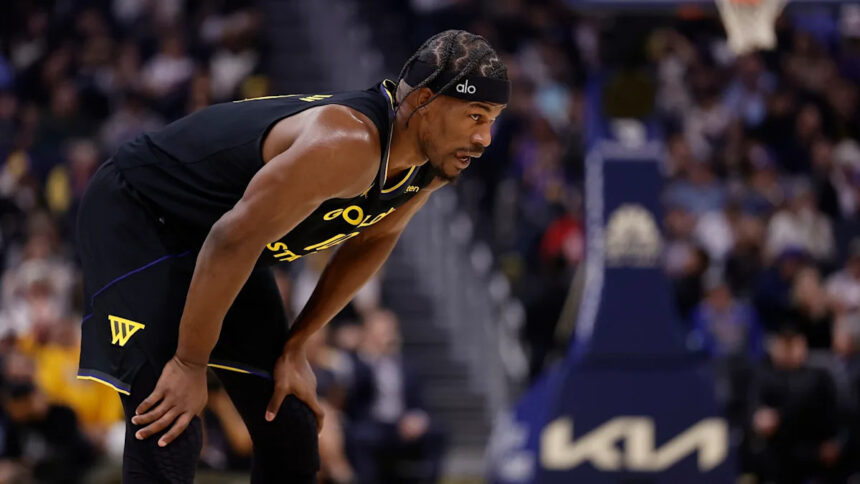 Jimmy Butler goes down, has to be helped off court with apparent knee injury