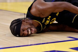 Warriors star Jimmy Butler's season over after devastating knee injury against Heat