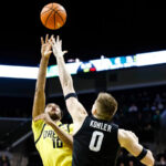 Carson Cooper scores 19 points and No. 10 Michigan State beats struggling Oregon 68-52