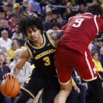 No. 3 Michigan uses defense late to hand No. 5 Nebraska its first loss