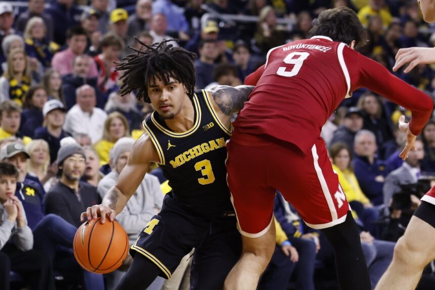No. 3 Michigan uses defense late to hand No. 5 Nebraska its first loss