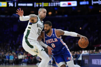 George and Embiid lead 76ers to victory over Bucks
