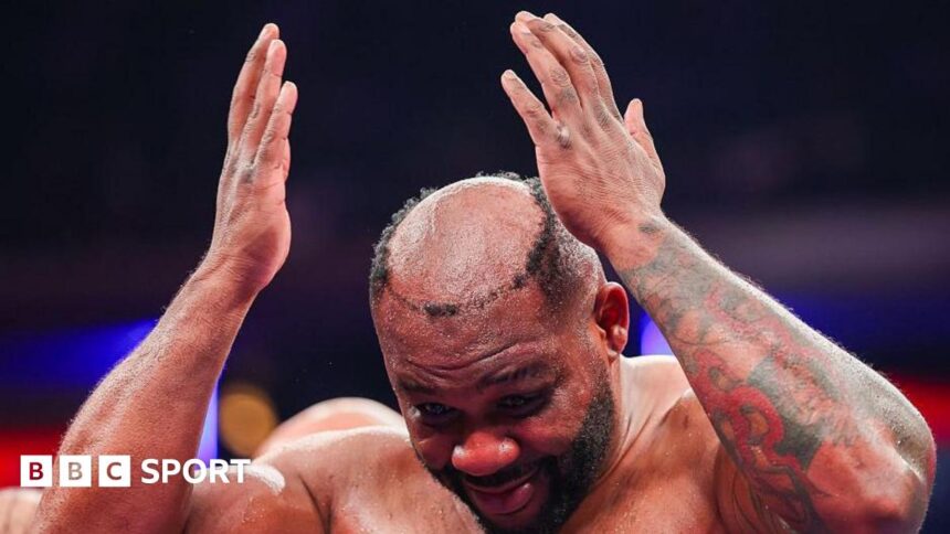 Miller hairpiece punched off during fight
