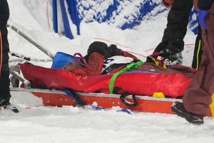 Canadian Olympic snowboarder drops out of big air event following hard crash
