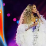Mariah Carey & Andrea Bocelli feature in sparkling opening ceremony
