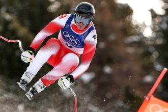 Switzerland claims first gold medal of Milan Cortina Olympics in men’s downhill