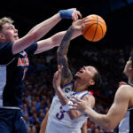 No. 9 Kansas beats top-ranked and previously unbeaten Arizona 82-78