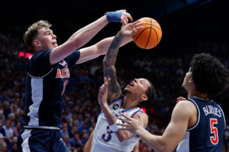 No. 9 Kansas beats top-ranked and previously unbeaten Arizona 82-78