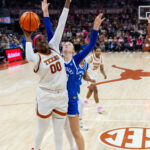 Justice Carlton leads Texas to victory over Kentucky with 17 points