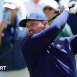 DeChambeau tops drive but makes birdie & ties lead