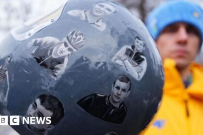 Who is on helmet that led to Ukrainian athlete's Winter Olympics ban?