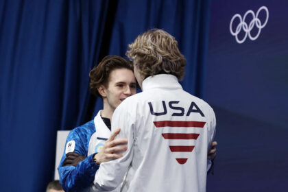 Ilia Malinin congratulates Mikhail Shaidorov after Olympic upset