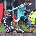 'A throwback' - Wolves beat Grimsby in FA Cup mudbath