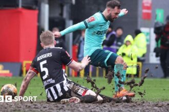 'A throwback' - Wolves beat Grimsby in FA Cup mudbath
