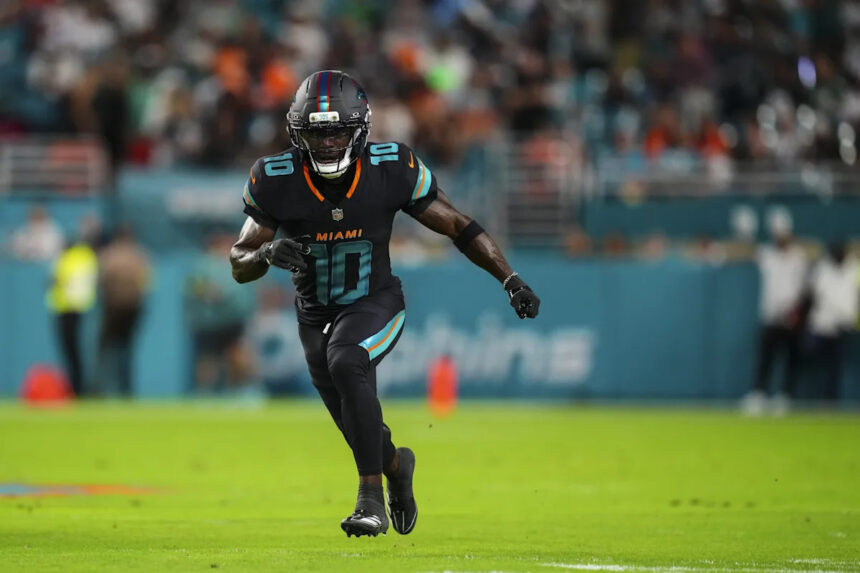 Dolphins release Tyreek Hill as cap cuts continue