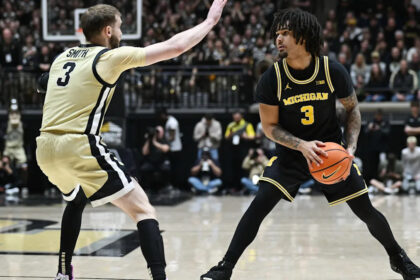 Elliot Cadeau scores 17 and No. 1 Michigan uses strong interior game to beat up No. 7 Purdue 91-80