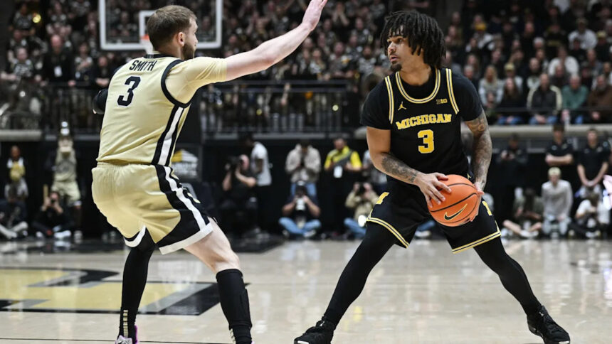 Elliot Cadeau scores 17 and No. 1 Michigan uses strong interior game to beat up No. 7 Purdue 91-80