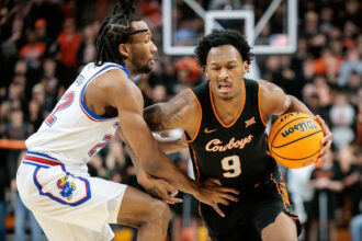 Freshman star Darryn Peterson erupts early as No. 8 Kansas rolls past Oklahoma State 81-69