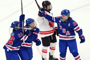 US women’s hockey team defeats Canada in overtime to win 3rd Olympic gold medal